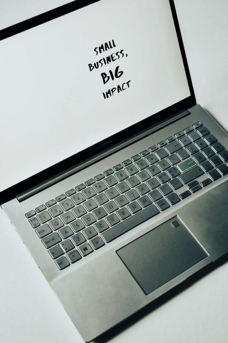 small business big impact written on laptop screen